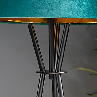 Embrace the power and beauty of the Evie tripod floor lamp. It marries a sleek iron base with a teal velvet drum shade for a brilliant look. Bringing light to your space in elegant style, this lamp is perfect for adding a final touch of contemporary charm.Made of iron with hardback drum velvet shade | Black powder coat finish | On/off foot switch | 1 E26 socket; type A bulb recommended (not included); 150-watt max | Non-skid bottom | Power cord included; UL Listed | Assembly required