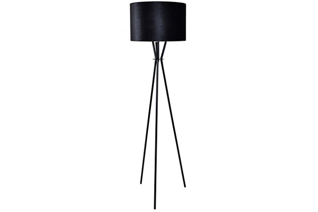Embrace the power and beauty of the Evie tripod floor lamp. It marries a sleek iron base with a black velvet drum shade for a brilliant look. Bringing light to your space in elegant style, this lamp is perfect for adding a final touch of contemporary charm.Made of iron with hardback drum velvet shade | Black powder coat finish | On/off foot switch | 1 E26 socket; type A bulb recommended (not included); 150-watt max | Non-skid bottom | Power cord included; UL Listed | Assembly required