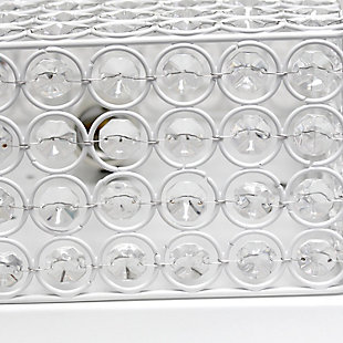 Luxury at its finest. This two light square crystal flush mount is the perfect accent piece for any room in your home. Elegant crystals are showcased on the flawless white base for a simple but glamourous look that complements your contemporary decor.Made with iron | White finish | Requires 2 x 60 watt Medium Base Type B Incandescent bulbs  (not included) | K5 crystals throughout; 4 rows of crystals in height | Requires 2 x 60 watt Medium Base Type B Incandescent bulbs  (not included) | Hardwired | Assembly required