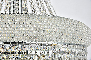 “Primo” means “first” in Italian, and the Primo collection lives up to its name as the top choice in classic, dramatic lighting. The symmetrical bell-shaped design offers variations in single, double, and triple tiers, with each canopy encrusted with multiple layers of round crystals. Delicate strands of crystals flare out from each canopy, ending in a profusion of crystal octagons and balls in the bottom hemisphere base. The Primo series of hanging fixtures comes in finishes of brilliant chrome or gold, which are refracted in the clear crystals | Width of 24 inches, height of 32 inches, and requires 14 candelabra bulbs | fixture is dimmable | comes with a 60 inch long hanging chain