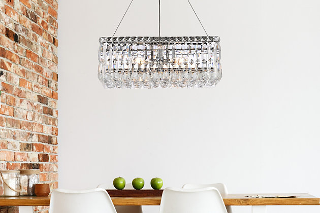 A riot of shapes and textures, Maxime collection hanging fixtures sparkle in a mosaic of crystal tiles. Square and rectangular precision-cut crystals form the flamboyant exterior while faceted crystal balls create a bubbled effect for light to shine through beneath. A mischievous asymmetrical hanging tube adds a touch of whimsy to this structured design. Available in a chrome finish with clear or golden-teak crystals, these lamps are a luxurious addition to a dining room, stairwell, foyer, or living room. Room use: Dining room; Living room; Bedroom; Bathroom; Entry Way; Closet | Length of 20 inches, width of 10 inches; minimum hanging height of 27 inches, maximum hanging height of 80 inches. | Warm, brilliant light is created by 4 light bulbs. (not included) | comes with an adjustable hanging cable