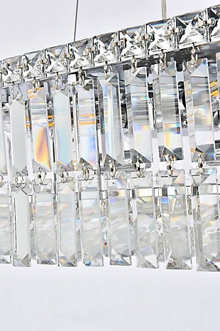 A riot of shapes and textures, Maxime collection hanging fixtures sparkle in a mosaic of crystal tiles. Square and rectangular precision-cut crystals form the flamboyant exterior while faceted crystal balls create a bubbled effect for light to shine through beneath. A mischievous asymmetrical hanging tube adds a touch of whimsy to this structured design. Available in a chrome finish with clear or golden-teak crystals, these lamps are a luxurious addition to a dining room, stairwell, foyer, or living room. Room use: Dining room; Living room; Bedroom; Bathroom; Entry Way; Closet | Length of 24 inches, width of 12 inches; minimum hanging height of 27 inches, maximum hanging height of 80 inches. | Warm, brilliant light is created by 6 light bulbs. (not included) | comes with an adjustable hanging cable
