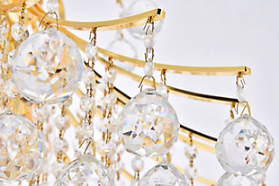 A treasure trove of glittering crystals, Toureg collection pendant lamps are generous with their sparkle. Stately curved steel arms and frame form an opulent flared shape available in chrome or gold finishes. Faceted clear crystal balls and crystal octagons offer a variety of options to choose from. Certain to be the center of attention in the dining room, living room, bedroom, or stairwell. Flared shape and curved steel arms, frame, and chain in a gold finish  | Clear faceted crystal balls and royal-cut crystal octagons  | Lamp features a diameter of 25 inches, a height of 31 inches, and requires 15 candelabra bulbs | comes with a 60 inch long hanging chain
