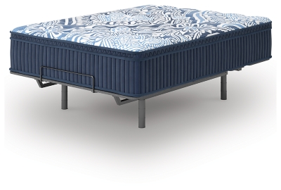 mattress with legs shown on a platform base with metal frame