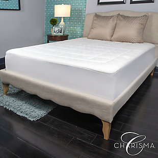 Add luxury and comfort to your bed with the hybrid construction of memory foam and fiber found in the Luxury Mattress Pad from Charisma®. The luxurious and durable circular-knit rayon fabric adds a layer of smooth softness to your mattress and features Stain-X Technology that makes it water repellent and stain resistant so your sleep experience is clean and comfortable. A layer of hypoallergenic memory foam quilted into the cover sits atop polyester fiber to provide a thin layer of pressure-relieving support and refreshing comfort. Easy-care foam allows this mattress pad to be machine washable and dryer safe for lasting freshness. The stretch-to-fit bed skirt fits mattresses up to 18 inches deep to secure the pad to your mattress and prevent it from shifting during the night.Luxury circular knit cover; durable rayon fabric cover adds a layer of smooth softness to your mattress | Fabric features Stain-X Technology to make the cover water repellent and stain resistant so you sleep clean and comfortable | A layer of quilted, hypoallergenic memory foam sits atop polyester fiber to provide a thin layer of pressure-relieving support and refreshing comfort | This mattress pad can be machine washed and is dryer safe for lasting freshness | Stretch-to-fit bed skirt is designed to fit mattresses up to 18 inches deep to keep the protector secure to your mattress and prevent it from shifting during the night | Charisma® is softness that you know will be there before you even touch it (an attention to detail and quality you can trust); with wonderful fabrics, Charisma® is the only choice for the discerning consumer who understands true luxury and the finer things in life