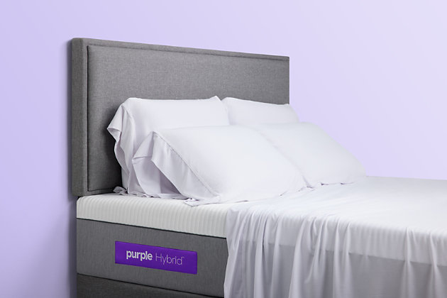 The mattress that broke the internet just got an upgrade. The Purple Hybrid mattress uses Purple’s patented Smart Comfort Grid™. The unique 2" top layer adapts to your body and stays cool for superior comfort, support, and better sleep. Purple has added a new base layer of individually wrapped responsive-support coils to enhance the overall comfort and durability of the mattress. The combination of the Purple Grid™ and patented responsive-support coils augment the responsiveness and open airflow for even more adaptive cool, No Pressure® Support. This mattress is perfect for sleepers who like their mattress a little on the firm side.Purple Smart Comfort Grid™ provides the perfect balance of firm and soft without compromise | The Purple Smart Comfort Grid™ is bordered with a high-density polyurethane foam to provide proper edge support | Soft flex, stretchy, and breathable mattress cover allows you to sink comfortably into bed | Open air channels and temperature-neutral materials for cooler sleep  | Motion isolating technology and responsive support coils base for superior comfort | Perfect for back and stomach sleepers | Allow 72 hours for mattress to fully decompress | 2" Hyper-Elastic Polymer™ material in Purple Smart Comfort Grid™ | Non-toxic polyethylene copolymer powder coating | 1" 2.0-lbs density polyurethane foam, 7.5" Pocketed Springs, CertiPUR-US certified foam base | Spot clean with mild detergent  | Fire retardant – non-toxic knit barrier | Twin XL dimensions: 38"x80"x11"