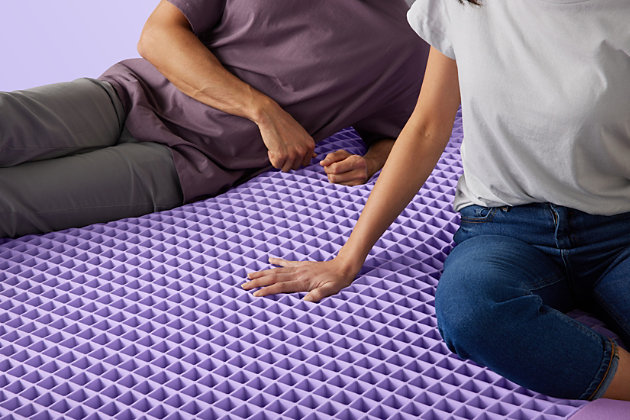 The mattress that broke the internet just got an upgrade. The Purple Hybrid mattress uses Purple’s patented Smart Comfort Grid™. The unique 2" top layer adapts to your body and stays cool for superior comfort, support, and better sleep. Purple has added a new base layer of individually wrapped responsive-support coils to enhance the overall comfort and durability of the mattress. The combination of the Purple Grid™ and patented responsive-support coils augment the responsiveness and open airflow for even more adaptive cool, No Pressure® Support. This mattress is perfect for sleepers who like their mattress a little on the firm side.Purple Smart Comfort Grid™ provides the perfect balance of firm and soft without compromise | The Purple Smart Comfort Grid™ is bordered with a high-density polyurethane foam to provide proper edge support | Soft flex, stretchy, and breathable mattress cover allows you to sink comfortably into bed | Open air channels and temperature-neutral materials for cooler sleep  | Motion isolating technology and responsive support coils base for superior comfort | Perfect for back and stomach sleepers | Allow 72 hours for mattress to fully decompress | 2" Hyper-Elastic Polymer™ material in Purple Smart Comfort Grid™ | Non-toxic polyethylene copolymer powder coating | 1" 2.0-lbs density polyurethane foam, 7.5" Pocketed Springs, CertiPUR-US certified foam base | Spot clean with mild detergent  | Fire retardant – non-toxic knit barrier | King dimensions: 76"x80"x11"