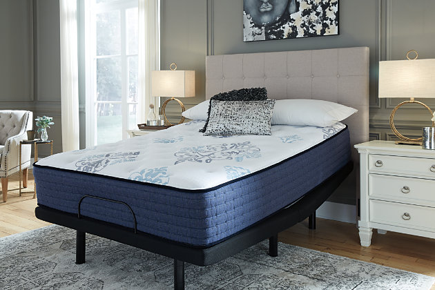 Experience the beauty of a great night’s sleep with the Bonita Springs twin mattress by Ashley-Sleep®, a luxurious innerspring mattress with the firm feel you prefer. Layers of firm high-density pressure relief foam and a power packed individually wrapped coil unit create an enclave of conforming comfort that supports you. Plus, a gel-infused memory foam layer enhances your comfort by delivering better support while keeping you at the right temperature. Another great perk that comes along with this mattress is that there's more room to spread out thanks to edge support formed by its foam encasing. Foundation/box spring available, sold separately.Comfort level: firm | Luxury knit quilt cover | High-density firm quilt foam; high-density firm body foam; high-density foam encasement | Zoned sculpted firm pressure relief foam | Lumbar gel memory foam | Power packed individually wrapped coil unit | 4 vertical handles for easy handling | Maintenance-free, one-sided design: no flipping or rotating | 10-year limited warranty | Note: Purchasing mattress and foundation from two different brands may void warranty; check warranty for details | Foundation/box spring sold separately; power base not available for twin size | State recycling fee may apply | Mattress ships in a box; please allow 48 hours for your mattress to fully expand after opening