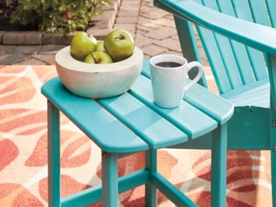 Add cottage-quaint charm to your outdoor oasis with the Sundown Treasure 3-piece outdoor set in turquoise. Made of a hearty hard plastic material, it’s sure to weather the seasons beautifully. Designed to shed rainwater, the chair and table’s slatted styling provides exceptional form and function.Includes 2 Adirondack chairs and 1 end table | Chair and table made of virgin high-density polyethylene (hard plastic) material | Chair and table with turquoise finish | Chair and table with textured grain finish | Chair and table slatted design | Assembly required | Estimated Assembly Time: 75 Minutes