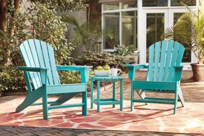 Add cottage-quaint charm to your outdoor oasis with the Sundown Treasure 3-piece outdoor set in turquoise. Made of a hearty hard plastic material, it’s sure to weather the seasons beautifully. Designed to shed rainwater, the chair and table’s slatted styling provides exceptional form and function.Includes 2 Adirondack chairs and 1 end table | Chair and table made of virgin high-density polyethylene (hard plastic) material | Chair and table with turquoise finish | Chair and table with textured grain finish | Chair and table slatted design | Assembly required | Estimated Assembly Time: 75 Minutes