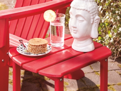 Add cottage-quaint charm to your outdoor oasis with the Sundown Treasure 3-piece outdoor set in red. Made of a hearty hard plastic material with a touch of texture, it’s sure to weather the seasons beautifully. Designed to shed rainwater, the chair and table’s slatted styling provides exceptional form and function.Includes 2 Adirondack chairs and 1 end table | Chair and table made of virgin high-density polyethylene (hard plastic) material | Chair and table with red finish | Chair and table with textured grain finish | Chair and table slatted design | No assembly required | Estimated Assembly Time: 75 Minutes