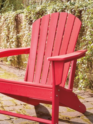 Add cottage-quaint charm to your outdoor oasis with the Sundown Treasure 3-piece outdoor set in red. Made of a hearty hard plastic material with a touch of texture, it’s sure to weather the seasons beautifully. Designed to shed rainwater, the chair and table’s slatted styling provides exceptional form and function.Includes 2 Adirondack chairs and 1 end table | Chair and table made of virgin high-density polyethylene (hard plastic) material | Chair and table with red finish | Chair and table with textured grain finish | Chair and table slatted design | No assembly required | Estimated Assembly Time: 75 Minutes