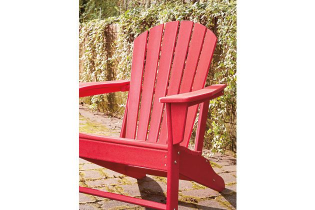 Add cottage-quaint charm to your outdoor oasis with the Sundown Treasure 2-piece outdoor set in red. Made of a hearty hard plastic material with a touch of texture, it’s sure to weather the seasons beautifully. Designed to shed rainwater, the chair and table’s slatted styling provides exceptional form and function.Includes 1 Adirondack chair and 1 end table | Chair and table made of virgin high-density polyethylene (hard plastic) material | Chair and table with red finish | Chair and table with textured grain finish | Chair and table slatted design | No assembly required | Estimated Assembly Time: 45 Minutes