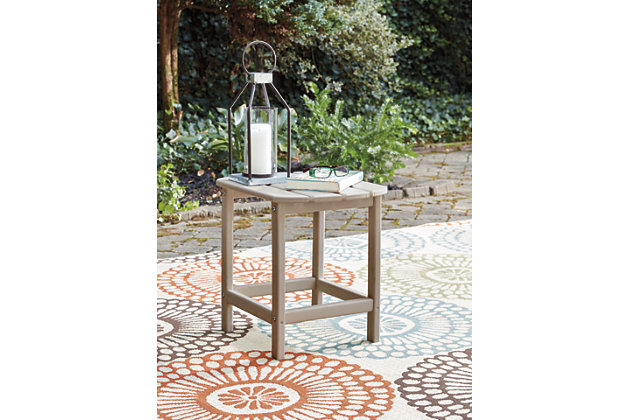 Add cottage-quaint charm to your outdoor oasis with the Sundown Treasure outdoor end table in grayish brown.  Made of MEGA TUFF™ high-density polyethylene material, it’s sure to weather the seasons beautifully. Designed to shed rainwater, the table’s slatted top with gently rounded corners provides exceptional form and function.Made of durable and sturdy HDPE high-density polyethylene grayish brown material | MEGA TUFF™ HDPE surfaces are made of high-density polyethylene, which gives the wood look you love and the weather resistance you crave | Stainless steel hardware | Designed to withstand the harsh elements of the outdoors | Slatted design | Assembly required | Estimated Assembly Time: 15 Minutes
