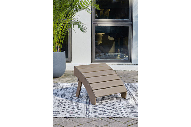 Add cottage-quaint charm to your outdoor oasis with the Sundown Treasure ottoman in grayish brown.  Made of MEGA TUFF™ high-density polyethylene material, it’s sure to weather the seasons beautifully. The ottoman's slatted styling with sloped shaping provides exceptional form and function.Made of durable and sturdy HDPE high-density polyethylene grayish brown material | MEGA TUFF™ HDPE surfaces are made of high-density polyethylene, which gives the wood look you love and the weather resistance you crave | Stainless steel hardware | Designed to withstand the harsh elements of the outdoors | Slatted design | No assembly required | Estimated Assembly Time: 15 Minutes