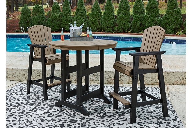 Raise the bar on outdoor living with the Fairen round bar table and bar stool set. Crafted for style, comfort and durability, the set impresses with a standout two-tone finish that pairs a light driftwood-look and black finish for twice the interest. Round table design keeps everyone in the flow of conversation, while the stools cater with sturdy armrests, an ample footrest, high shell back and waterfall wrapped seat for curvaceous comfort.Includes rounded bar table and set of 2 bar stools | Table and stool made of durable and sturdy HDPE material | Table and stool designed to withstand the harsh elements of the outdoors | Table and stool with two-tone driftwood-look/black finish | Table with umbrella hole (with cover cap for when not in use) | Assembly required | Estimated Assembly Time: 75 Minutes