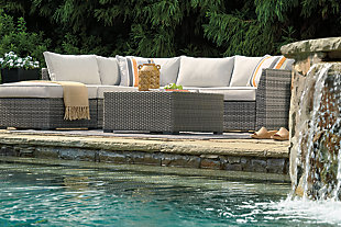 Turn your outdoor space into a sweet retreat with the Cherry Point 4-piece outdoor sectional. High style crafted for low-maintenance living, this decidedly clean and contemporary outdoor furniture set entices in an easy-breezy gray resin wicker over a rust-free aluminum frame for an upscale aesthetic that’s downright durable. Wrapped in high-performing Nuvella® fabric, the plush cushions are indulgently comfortable yet so carefree.Includes sectional (with loveseat/ottoman) and coffee table | All-weather resin wicker handwoven over rust-free aluminum frame | Resin wood-look tabletop | Zippered cushions covered in high-performing Nuvella® fabric | All-weather foam cushion core wrapped in soft polyester | Imported fabric and fill | Includes 2 throw pillows | Clean fabric with mild soap and water, let air dry; for stubborn stains, use a solution of 1 cup bleach to 1 gallon water | Assembly required | Estimated Assembly Time: 30 Minutes