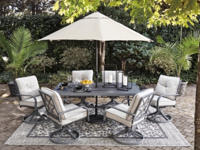 outside table and chairs with umbrella