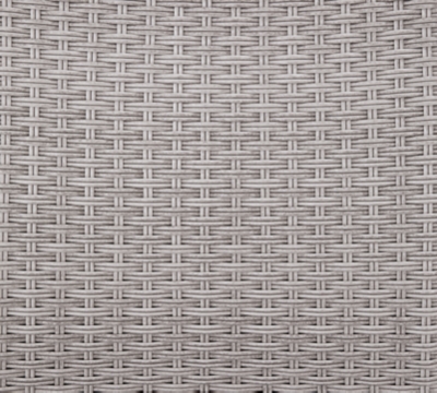 rear view of outdoor wicker sofa with curved armrests and gray frame