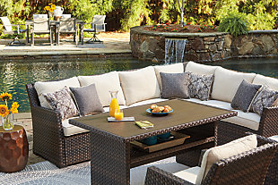 Alfresco living is easy to love with the Easy Isle outdoor furniture set. Resin wicker over a rust-free aluminum frame lends an upscale aesthetic that’s downright durable. Wrapped in high-performing Nuvella® fabric, the plush, neutral-tone cushions and throw pillows are comfortable and carefree. Clean lines and slim track arms surely appeal to those with contemporary taste.Includes 2-piece cushioned sectional and lounge chair | All-weather resin wicker handwoven over rust-free aluminum frame | Powder coated aluminum resists rusting and fading | Zippered cushions covered in high-performing Nuvella® fabric | All-weather foam cushion core wrapped in soft polyester | 6 throw pillows included | Clean fabric with mild soap and water, let air dry; for stubborn stains, use a solution of 1 cup bleach to 1 gallon water | Imported fabric and fill | Assembly required | Estimated Assembly Time: 30 Minutes