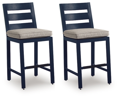 Two navy blue bar stools with gray cushions