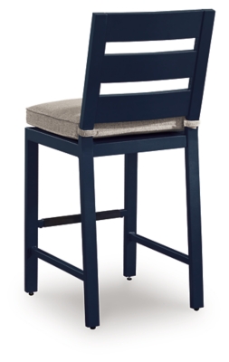 Back of navy blue bar stool