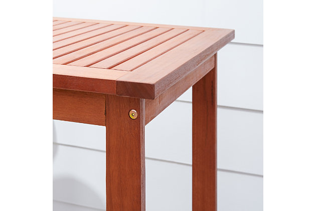 The perfect table to stand between your patio bar chairs, the Malibu bar table will offer a convenient place for drinks, snacks or a casual meal outdoors. Made from 100% eucalyptus—a very durable hardwood—this table can stand up to all kinds of changes in the weather. The core of the eucalyptus is very dense. It quickly repels water and its natural oil combats and repels wood eating insects.Made of eucalyptus | Natural wood finish | Square slatted tabletop, high straight legs with footrest | Apply oil to maintain finish | Holds up to 150 pounds | Assembly required