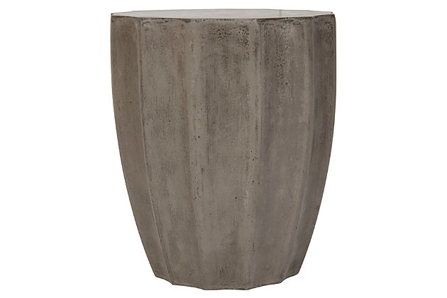 An exhibition of antiquity’s architectural marvels at the world’s top encyclopedic museum inspired this contemporary concrete accent table. Its nuanced design and dark gray hue highlight the symmetric ideal defining beauty in the ancient and modern worlds. Perfect for indoor and outdoor use.Made of concrete | Suitable for indoor/outdoor use | Spills should be taken care of immediately before they stain; do not use bleach solutions | Weight capacity 175 lbs