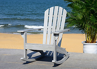 Go on, relax and sit for a spell. This traditional Adirondack rocking chair was created for those who enjoy the outdoors from the first sign of spring until the first flake of snow. Its natural finish and fine eucalyptus wood construction make it a backyard or front porch classic.Made of eucalyptus wood and galvanized steel | Suitable for indoor/outdoor use | Spills should be taken care of immediately before they stain; do not use bleach solutions | Weight capacity 275 lbs | Assembly required