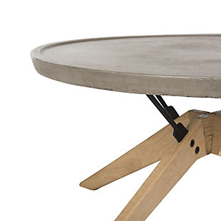 Designed to make a grand statement, this concrete round indoor-outdoor coffee table lends industrial luxe style to any contemporary space. Crafted with a natural oak finish and a dark gray hue, it’s ideal for the living room or outdoor entertaining area.Made of oak wood, steel and concrete | Suitable for indoor/outdoor use | Spills should be taken care of immediately before they stain; do not use bleach solutions | Weight capacity 15 lbs | Assembly required