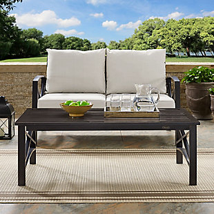 Entertain outdoors in style with this high-quality coffee table. Durably crafted from all-weather rust-protected steel with classic x-bar supports and a slatted tabletop, this masterfully styled metal outdoor table exudes an easy-elegant aesthetic perfect for an outdoor oasis.Made of steel with all-weather, rust protection | Slatted tabletop | Simple x design | Assembly required