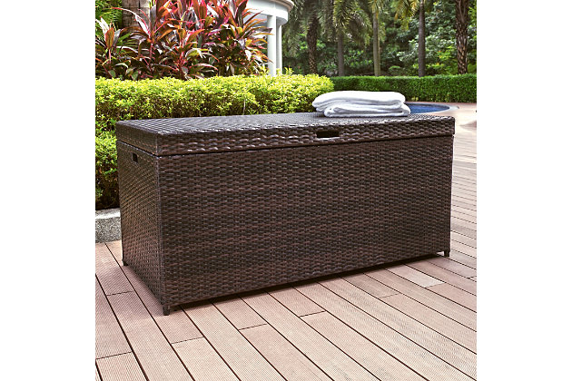 You’ll love what’s in store with this outdoor wicker storage bin. Merging form and function in a beautiful way, this finely crafted outdoor essential is made with intricately handwoven resin wicker over a durable steel frame. Generously sized to meet your needs, this outdoor storage bin with pneumatic hinge for smooth closing is the ideal place for storing furniture cushions and garden necessities.Durable powdercoated steel frame | Uv-resistant outdoor resin wicker | Pneumatic hinge supports for smooth closing | Designed to fit cushions up to 24" square | Assembly required