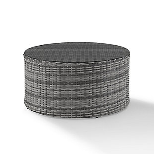 Stylish and functional. This round coffee table, composed of all-weather resin wicker elegantly woven over a durable powdercoated steel frame is topped with a tempered glass surface. Great on its own or paired with the rest of your outdoor decor, this table rounds out your outdoor space perfectly.Made of steel, resin wicker and tempered glass | Gray faux rattan over steel powdercoat frame | Weather resistant | Assembly required
