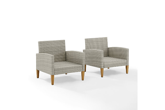 Prepare to lounge and chat away in this highly stylish chair set. Blending cool neutral tones with natural finishes provides a chic upgrade to your outdoor space. All-weather resin wicker and quick-drying olefin fabric come together to create durability and sustainability. The classic tapered legs are made from sturdy steel painted to look like real wood. Place these chairs proudly next to your favorite patio furniture to complete your outdoor oasis.Set of 2 | Made of steel, resin wicker and fabric | Gray faux rattan over steel powdercoat frame | Gray olefin polyester quick-dry cushions | Uv resistant resin wicker | Assembly required