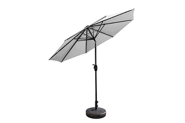 Add this umbrella and base set to your patio lounge or dining set for extra protection from the sun. This deluxe umbrella features an easy crank-and-tilt system so you can protect yourself from the sun and enjoy the fresh air. The best part is that the fillable base stand is included, so this set is ready to put up. Includes umbrella and fillable base  | Bronze-tone powder coated aluminum frame with 8 steel ribs | Water- and fade-resistant white polyester canopy with air ventilation  | 20" sturdy plastic fillable base with bronze-tone finish; weather resistant | Rust proof and anti-corrosive  | Easy crank open with tilt adjustment | Weight capacity 55 lbs. when filled with water and sand | Assembly required | Ships in 2 boxes | Estimated Assembly Time: 5 Minutes