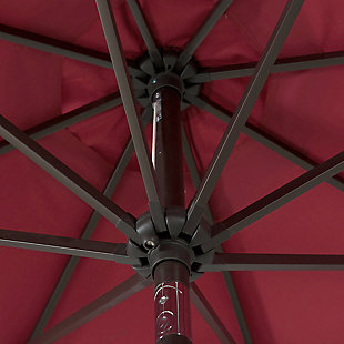 Enjoy being outdoors without the sun blasting down on you as you sit underneath this 9-foot patio umbrella and fillable base set. Use the vibrant umbrella to shield yourself from the elements and put a fun twist on your outdoor decor. A push-button tilt mechanism lets you adjust as you please so you can get just the right amount of sun. The base allows you to move the umbrella to any part of your yard. The best part is both are easy to set up, clean and require minimal maintenance.Includes umbrella and fillable base  | Bronze-tone powder coated aluminum frame with 8 steel ribs | Water- and fade-resistant red polyester canopy with air ventilation  | 20" sturdy plastic fillable base with black finish; weather resistant | Rust proof and anti-corrosive  | Easy crank open with tilt adjustment | Weight capacity 55 lbs. when filled with water and sand | Assembly required | Ships in 2 boxes | Estimated Assembly Time: 5 Minutes