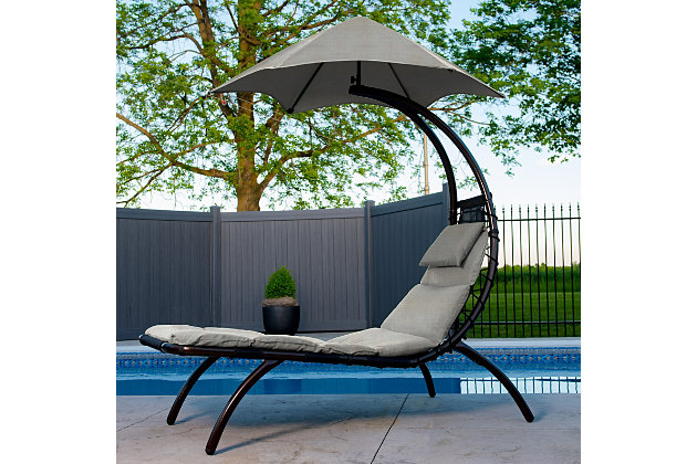 It’s a dream come true—an innovation in backyard comfort and style. The Original Dream Lounger is a down-to-earth take on the popular Original Dream Chair. Curved legs support a grounded feel for the spacious lounging bed, while the enhanced spun-polyester fabric combats fading. The umbrella shades away the sun to make reading or napping even more relaxing. Order a pair for a dynamic backyard duo, or mix and match with The Original Dream Chair.Outdoor lounge chair with umbrella | Made of polyester and steel | Easy assembly | Enhanced spun-polyester fabric resists fading | Large six-point umbrella | Imported