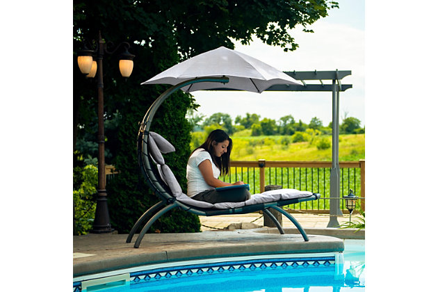 It’s a dream come true—an innovation in backyard comfort and style. The Original Dream Lounger is a down-to-earth take on the popular Original Dream Chair. Curved legs support a grounded feel for the spacious lounging bed, while the enhanced spun-polyester fabric combats fading. The umbrella shades away the sun to make reading or napping even more relaxing. Order a pair for a dynamic backyard duo, or mix and match with The Original Dream Chair.Outdoor lounge chair with umbrella | Made of polyester and steel | Easy assembly | Enhanced spun-polyester fabric resists fading | Large six-point umbrella | Imported