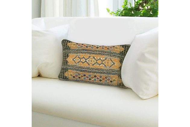 This decorative stripe pillow features deep, vivid colors in a tribal-inspired design, adding the perfect touch of interest to any traditional or bohemian decor. Mastery woven for strength and durability, its weather-resistant soft polypropylene face creates the perfect soft touch. The easy-care pillow has a removable cover with a zipper closure. Crafted on a traditional loom, then stitched to a durable polyester bac, it has a worldly aesthetic that brings chic ambiance to your space.Made of polypropylene | 12" x 18" | Soft polyfill | Wilton woven | Indoor-outdoor | Machine washable; dry flat | Zipper closure | Fade resistant | Imported
