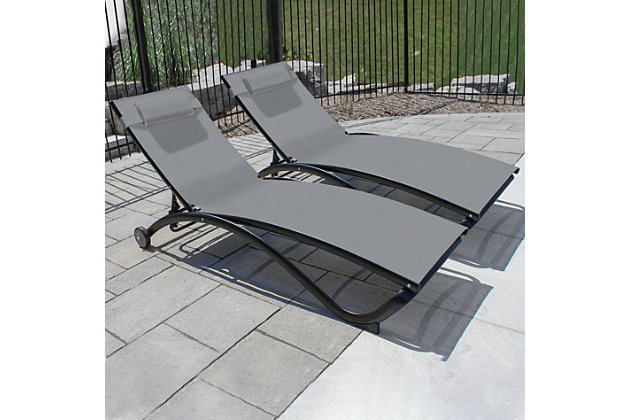 With a contoured shape and 5 adjustable positions to choose from, the Glendale Pool Lounger provides an exceptional relaxing experience. The 5 positions allow you to experience maximum comfort and the rubberized feet at the foot of the lounger add a soft touch. With wheels on the other side of the lounger, it's easy to follow the sun around poolside, and these loungers also collapse and stack for compact storage. To make it even better, each lounger comes with an adjustable head pillow, so you can enjoy this lounger no matter what your height!With a curved design and modern design with no armrests, this lounger allows 5 different positions of recline. Go ahead and find the position that's most comfortable for you. | Made of breathable acrylic mesh fabric, it's easy for the Glendale Lounger to manage moisture. The fabric makes it easy to wipe away water and have your lounger air dry in just seconds. | The aluminum frame of this lounger has been brushed matte black, and will maintain its rust-free appearance for years to come. | The two wheels make it easy to move this lightweight lounger around your deck, patio, or poolside. | This lounger easily folds to a compact size for convenient off-season storage and is completely stackable.
