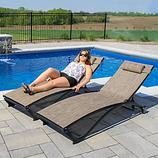 With a contoured shape and 5 adjustable positions to choose from, the Glendale Pool Lounger provides an exceptional relaxing experience. The 5 positions allow you to experience maximum comfort and the rubberized feet at the foot of the lounger add a soft touch. With wheels on the other side of the lounger, it's easy to follow the sun around poolside, and these loungers also collapse and stack for compact storage. To make it even better, each lounger comes with an adjustable head pillow, so you can enjoy this lounger no matter what your height!With a curved design and modern design with no armrests, this lounger allows 5 different positions of recline. Go ahead and find the position that's most comfortable for you. | Made of breathable acrylic mesh fabric, it's easy for the Glendale Lounger to manage moisture. The fabric makes it easy to wipe away water and have your lounger air dry in just seconds. | The aluminum frame of this lounger has been brushed matte black, and will maintain its rust-free appearance for years to come. | The two wheels make it easy to move this lightweight lounger around your deck, patio, or poolside. | This lounger easily folds to a compact size for convenient off-season storage and is completely stackable.