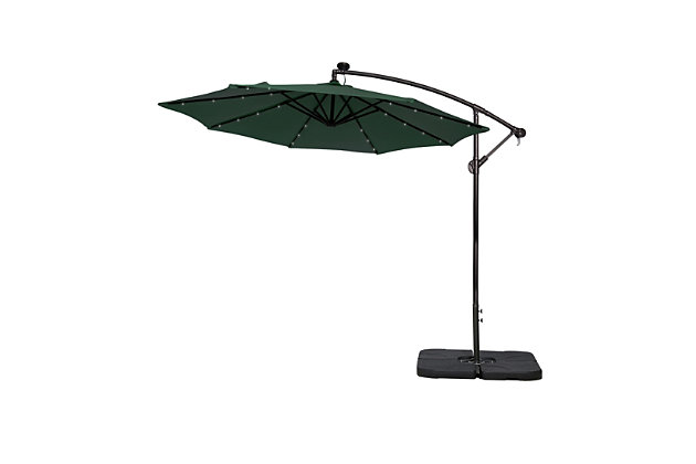 Not your average umbrella, the Lucia features a solar panel that uses the power of the sun to illuminate the bulbs lining each steel rib inside. When fully charged, these lights last eight to 10 hours so, day or night, this umbrella helps you have a blast outdoors. The base is included, so this set is ready to put up.Includes light up LED umbrella and 4-piece fillable weight base  | Powder coated aluminum frame with 8 steel ribs with lights | Water- and fade-resistant dark green polyester canopy with air ventilation  | Black base weights are made from heavy duty plastic  | Base weight includes a carrying handle  | Easy crank open with tilt adjustment | Fill capacity for base weight: 200 lbs. of sand or 6 liters of water | Assembly required | Ships in 2 boxes