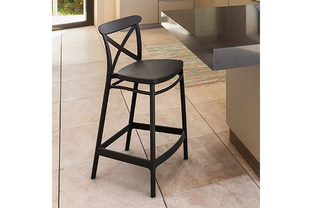 The Cross outdoor counter stool sports a classic design that smoothly blends with a variety of styles. Made from polypropylene resin with gas injection molded legs, this chair is suitable for indoors and outdoors. The relaxed linear design of the chair is suitable for restaurants, cafes and hotels. Comes in a set of two.Set of 2 | Made from commercial-grade resin polypropylene | Black | Resistant to sunlight, chlorine, salt, stains and suntan oils | Easy to keep clean | Stackable for easy storage | Extremely durable; perfect for heavy use in any indoor or outdoor areas | Assembly required