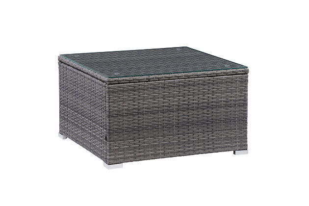 Use it as a footrest, put out a spread for guests or simply hold your cold beverage on this multi-faceted coffee table. Stylish and functional, its tempered glass with suction grips, makes sliding a thing of the past while its UV resistant resin wicker maintains a bright and fresh appearance year after year. This piece will complete any patio set and its durable, powder-coated steel frame will stand up against rain or shine.Made with galvanized powder coated steel for durability | Made using Weather rated PVC for long lasting enjoyment | 5mm inset clear tempered safety glass table top with suction grips to keep glass in place | Metal capped feet for a stylish finish | Galvanized powder coated steel helps resist rust | Low maintenance