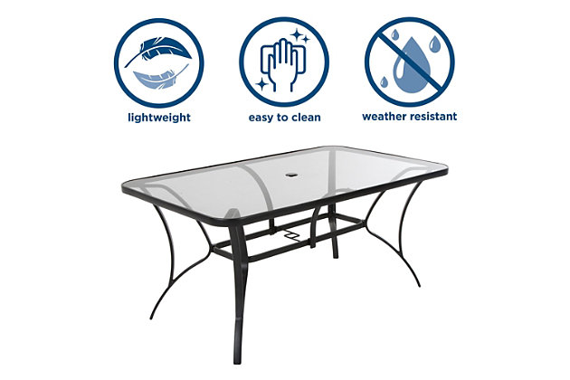 Grab the COSCO Outdoor Living Paloma steel dining table to share an outdoor meal with friends and family. Featuring a classic design with charcoal gray hues, this table will bring style to your outdoor furniture decor. The tempered glass top is large and includes an umbrella opening for those bright, sunny days (umbrella not included). The tabletop offers plenty of space for all your table accompaniments.Strong tempered glass tabletop and weather-resistant powdercoated steel frame | Easy to clean | Assembly required
