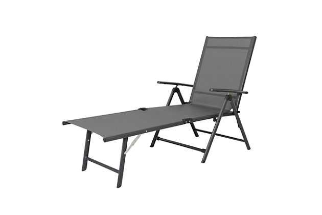Whether your ideal way to relax is to read, sleep or sip a cocktail in the sun, this chaise lounge chair is designed to help you unwind outside. Its tall back is supported by a series of notches that allow you to slightly recline or lie fully flat. The sling-style seat is made of PVC-coated polyester fabric that holds up well to chlorine and salt, so you can sunbathe after you swim. This durable piece's steel frame sports a powdercoat finish that helps to resist weather, rusting and fading, and it conveniently folds to save space when it's not in use.Made of metal and polyester | All-weather frame with durable black powdercoat finish | Gray Textilene fabric | Weight capacity 250 pounds | Foldable design | No assembly required