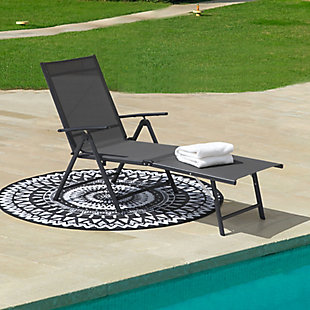 Whether your ideal way to relax is to read, sleep or sip a cocktail in the sun, this chaise lounge chair is designed to help you unwind outside. Its tall back is supported by a series of notches that allow you to slightly recline or lie fully flat. The sling-style seat is made of PVC-coated polyester fabric that holds up well to chlorine and salt, so you can sunbathe after you swim. This durable piece's steel frame sports a powdercoat finish that helps to resist weather, rusting and fading, and it conveniently folds to save space when it's not in use.Made of metal and polyester | All-weather frame with durable black powdercoat finish | Gray Textilene fabric | Weight capacity 250 pounds | Foldable design | No assembly required