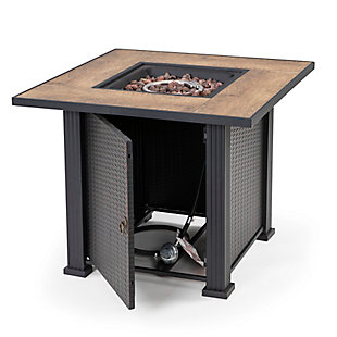 With its slate tile and steel mantel, this handcrafted propane fire pit table features the classic elements of high-end furniture, with the durability of weather-resistant steel. Its decorative base cleverly conceals a propane tank (not included) and control panel, making it an attractive centerpiece for your outdoor living space. Complete with a 50,000 BTU stainless steel burner, this fire pit lets you enjoy all the ambiance of a classic fire without the mess of tending ashes. Adding to the elegance, it includes lava rock that beautifully accents its flames.Made of metal and ceramic | All-weather frame with durable black finish | Lava rock | 20-pound propane tank required (sold separately) | Assembly required