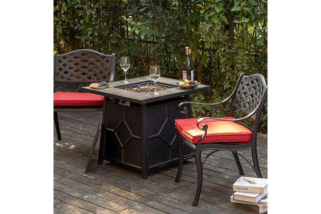 This fashionable and functional gas fire pit table sports a square ceramic tabletop and steel frame sealed to resist moisture and other kinds of weather. The fire pit's center burner holds alluring lava rocks and flames that burn quietly while you entertain your guests.Anti-rust steel frame | Internal control knob in table base allows you to adjust heat output | Impressive strength and durability; resistant to heat; low maintenance | Includes lava rocks | Runs on propane (not included) | Easy to assemble