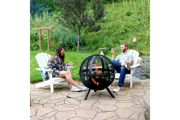Illuminate your outdoor spaces with a flaming ball of fire. This ball of fire outdoor fire pit adds a unique touch to any deck or patio. Constructed of sturdy steel, it features a thirty-inch fire bowl within a spherical grate to give the appearance of a floating ball of fire at night. A large, pivoting spark screen keeps flying embers safely contained while allowing easy access to the fire for adding fuel and cooking s'mores or hot dogs. Handles make it easy to move from one part of the deck to another.Made of steel and steel mesh | High-temperature black paint finish | Mesh dome with easy grip handle | 3 legs | Fire bowl tray with handles | Poker | Firewood grate | PVC cover | Comes with a standard 1-year limited warranty | Imported | Assembly required